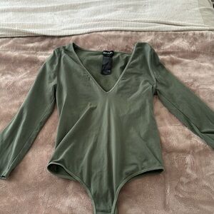 BEBE size medium long sleeve body suit
